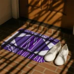 custom-northwestern-wildcats-football-crest-purple-black-doormat-best-selling.webp
