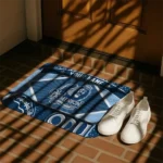 custom-old-dominion-monarchs-football-crest-blue-black-doormat-best-selling.webp
