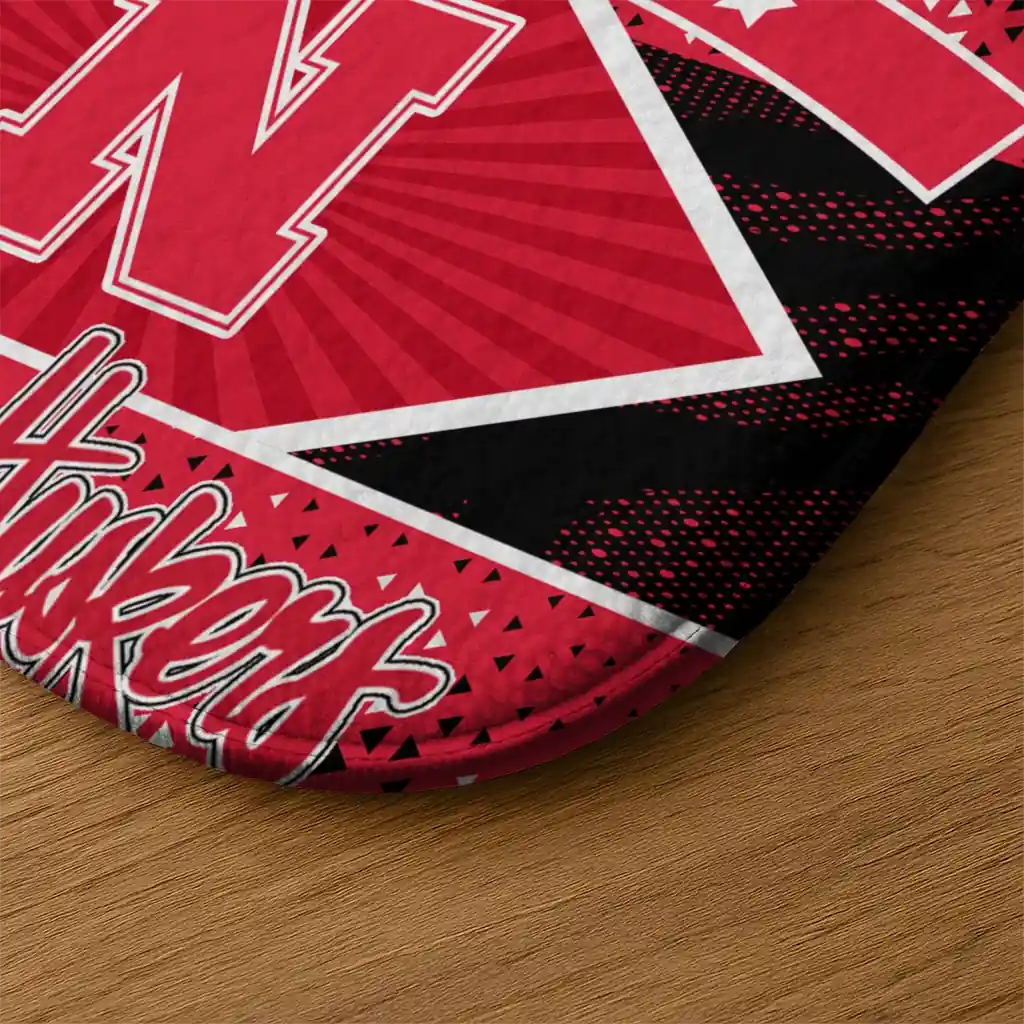 customized-nebraska-cornhuskers-football-crest-red-black-doormat-latest-model.webp