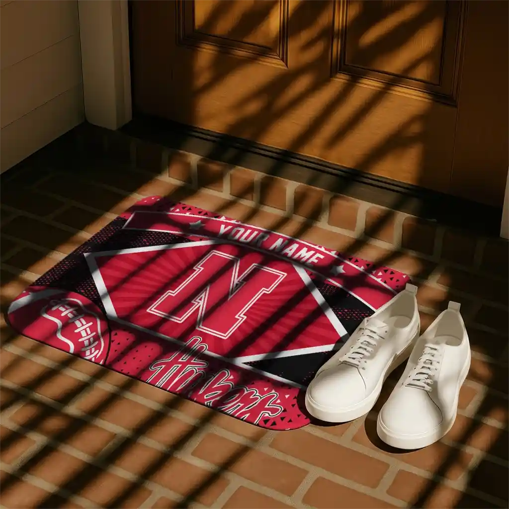 customized-nebraska-cornhuskers-football-crest-red-black-doormat-trendy.webp