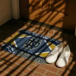 customized-notre-dame-fighting-irish-football-crest-navy-black-doormat-best-selling.webp