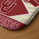 customized-oklahoma-sooners-football-crest-crimson-black-doormat-best-selling.webp