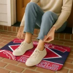 customized-ole-miss-rebels-football-crest-red-black-doormat-best-selling.webp