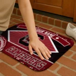 customized-south-carolina-gamecocks-football-crest-garnet-black-doormat-best-selling.webp