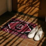 customized-south-carolina-gamecocks-football-crest-garnet-black-doormat-best-selling.webp
