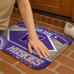 customized-washington-huskies-football-crest-purple-black-doormat-best-selling.webp