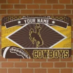customized-wyoming-cowboys-football-crest-brown-black-doormat-best-selling.webp