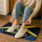 marquette-golden-eagles-techno-camo-blue-black-doormat-best-selling.webp