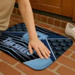north-carolina-tar-heels-techno-camo-light-blue-black-doormat-best-selling.webp