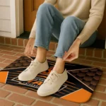 oklahoma-state-cowboys-techno-camo-orange-black-doormat-best-selling.webp