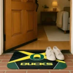 oregon-ducks-techno-camo-green-black-doormat-best-selling.webp