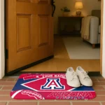 personalized-arizona-wildcats-football-crest-red-black-doormat-best-selling.webp