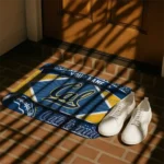 personalized-california-golden-bears-football-crest-blue-black-doormat-best-selling.webp