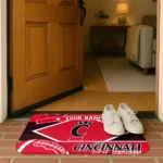 personalized-cincinnati-bearcats-football-crest-red-black-doormat-best-selling.webp