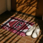 personalized-colgate-raiders-football-crest-maroon-black-doormat-best-selling.webp