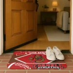 personalized-cornell-big-red-football-crest-red-black-doormat-best-selling.webp