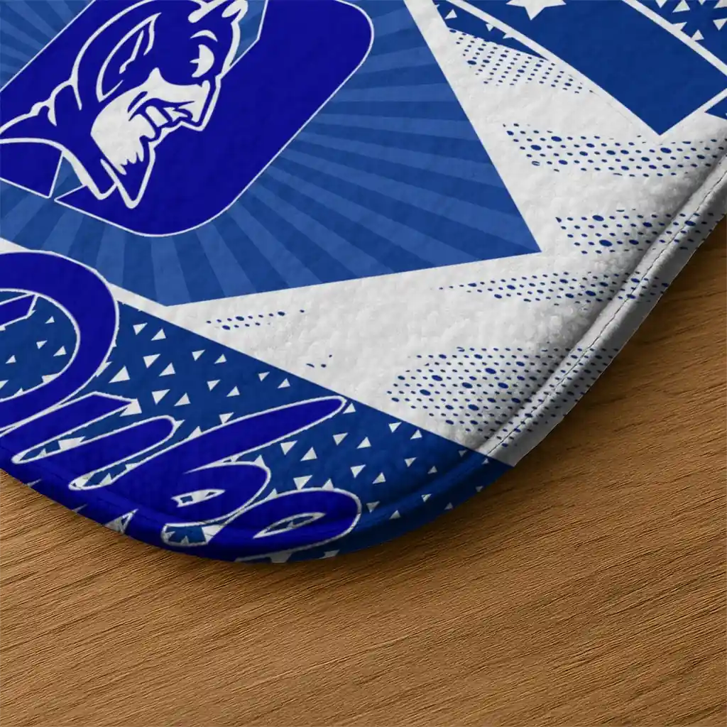 personalized-duke-blue-devils-football-crest-blue-black-doormat-latest-model.webp