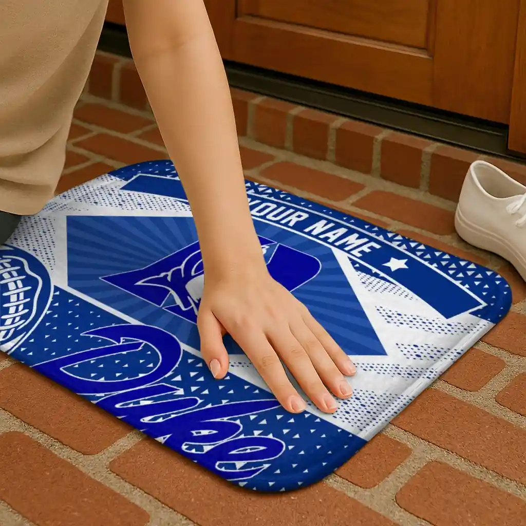 personalized-duke-blue-devils-football-crest-blue-black-doormat-premium-grade.webp