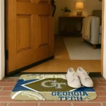 personalized-georgia-tech-yellow-jackets-football-crest-gold-black-doormat-best-selling.webp