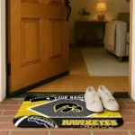 personalized-iowa-hawkeyes-football-crest-black-doormat-best-selling.webp