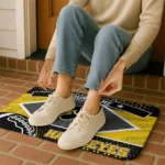 personalized-iowa-hawkeyes-football-crest-black-doormat-best-selling.webp