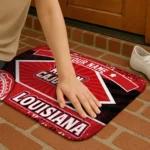 personalized-louisiana-ragin-cajuns-football-crest-red-black-doormat-best-selling.webp