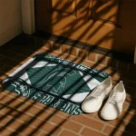 personalized-michigan-state-spartans-football-crest-green-black-doormat-best-selling.webp