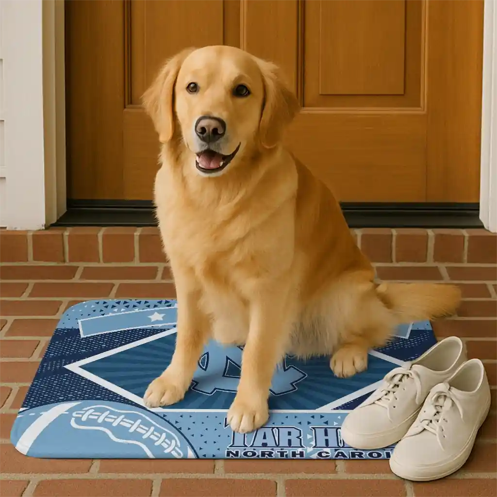 personalized-north-carolina-tar-heels-football-crest-light-blue-black-doormat-high-quality.webp
