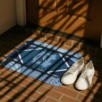 personalized-north-carolina-tar-heels-football-crest-light-blue-black-doormat-best-selling.webp