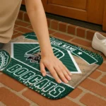 personalized-ohio-bobcats-football-crest-green-black-doormat-best-selling.webp
