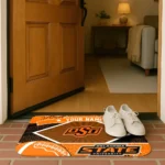 personalized-oklahoma-state-cowboys-football-crest-orange-black-doormat-best-selling.webp