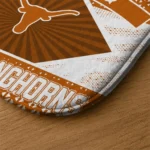 personalized-texas-longhorns-football-crest-orange-black-doormat-best-selling.webp