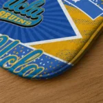 personalized-ucla-bruins-football-crest-blue-black-doormat-best-selling.webp
