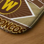 personalized-western-michigan-broncos-football-crest-brown-black-doormat-best-selling.webp