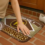 personalized-western-michigan-broncos-football-crest-brown-black-doormat-best-selling.webp
