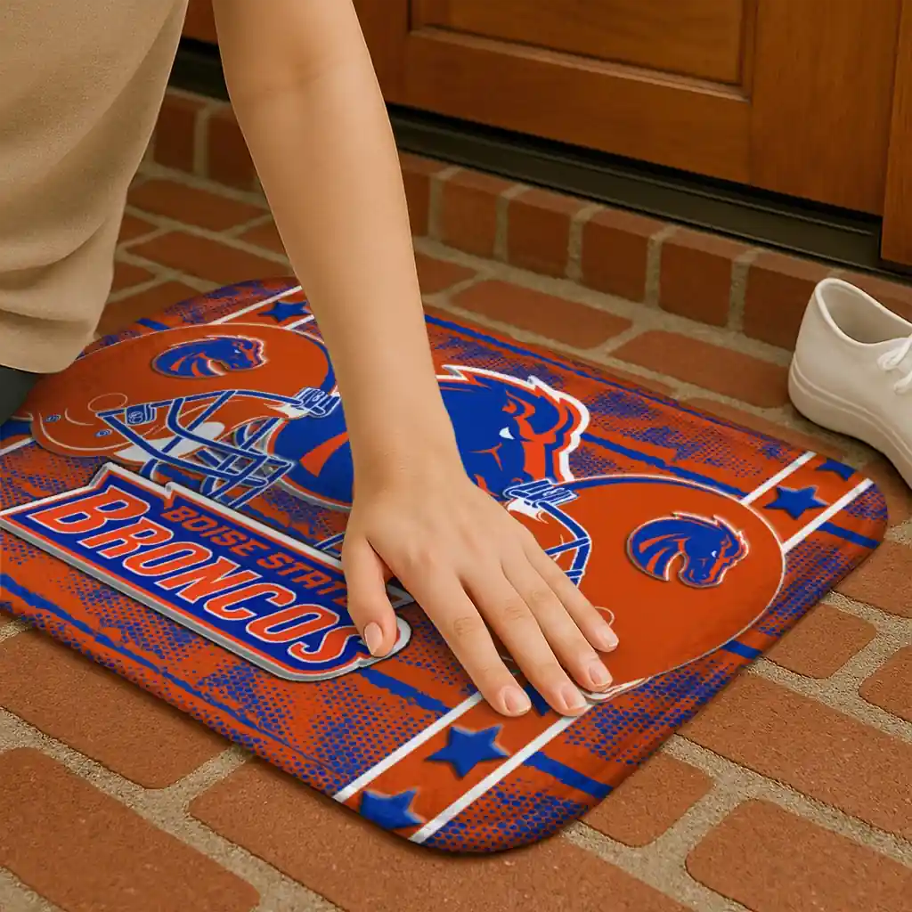 boise-state-broncos-helmet-illustration-orange-doormat-premium-grade.webp