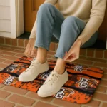 bowling-green-falcons-palm-silhouette-orange-black-doormat-best-selling.webp