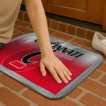 cincinnati-bearcats-pixel-blur-red-doormat-best-selling.webp