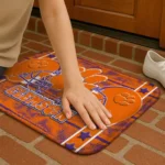 clemson-tigers-helmet-illustration-orange-doormat-best-selling.webp