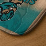 coastal-carolina-chanticleers-pixel-blur-green-doormat-best-selling.webp