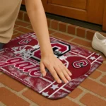 colgate-raiders-helmet-illustration-maroon-doormat-best-selling.webp