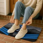 creighton-bluejays-chevron-points-blue-black-doormat-best-selling.webp