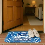 creighton-bluejays-helmet-illustration-blue-doormat-best-selling.webp