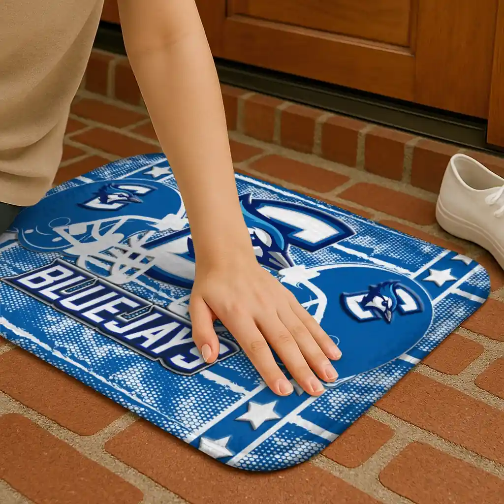 creighton-bluejays-helmet-illustration-blue-doormat-premium-grade.webp