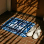 creighton-bluejays-helmet-illustration-blue-doormat-best-selling.webp