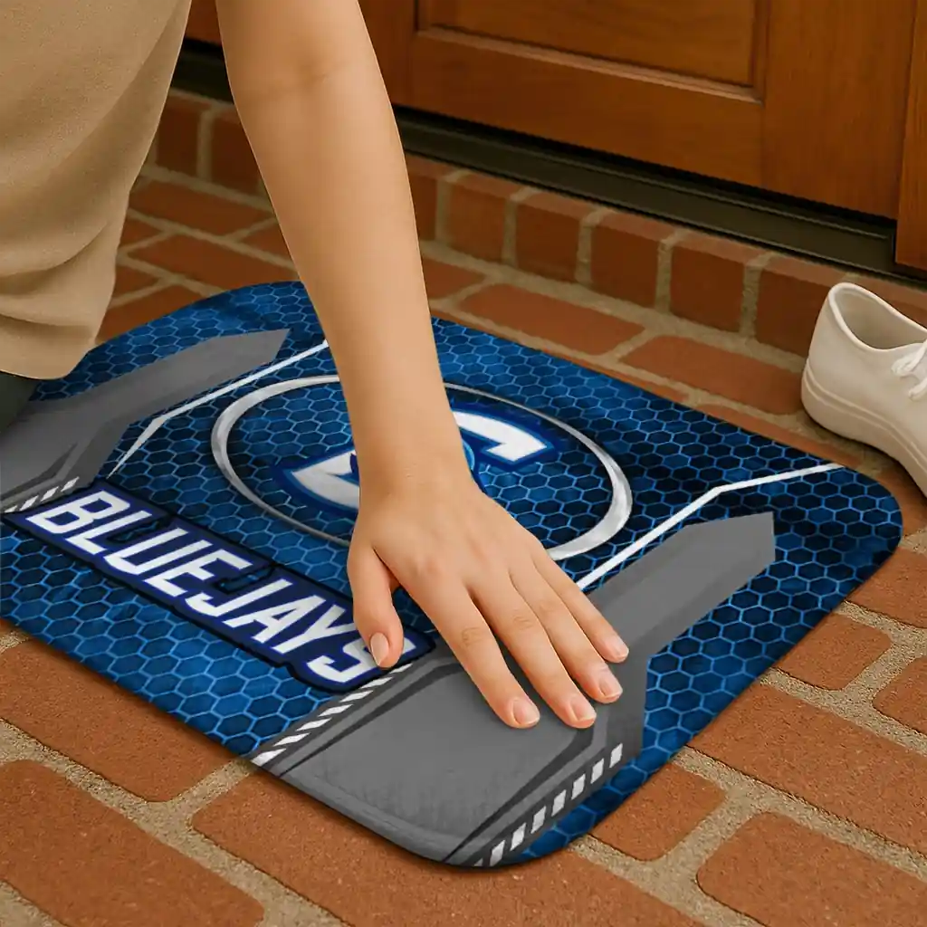 creighton-bluejays-hexagon-oval-blue-doormat-premium-grade.webp