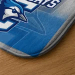 creighton-bluejays-pixel-blur-blue-doormat-best-selling.webp