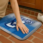 creighton-bluejays-pixel-blur-blue-doormat-best-selling.webp