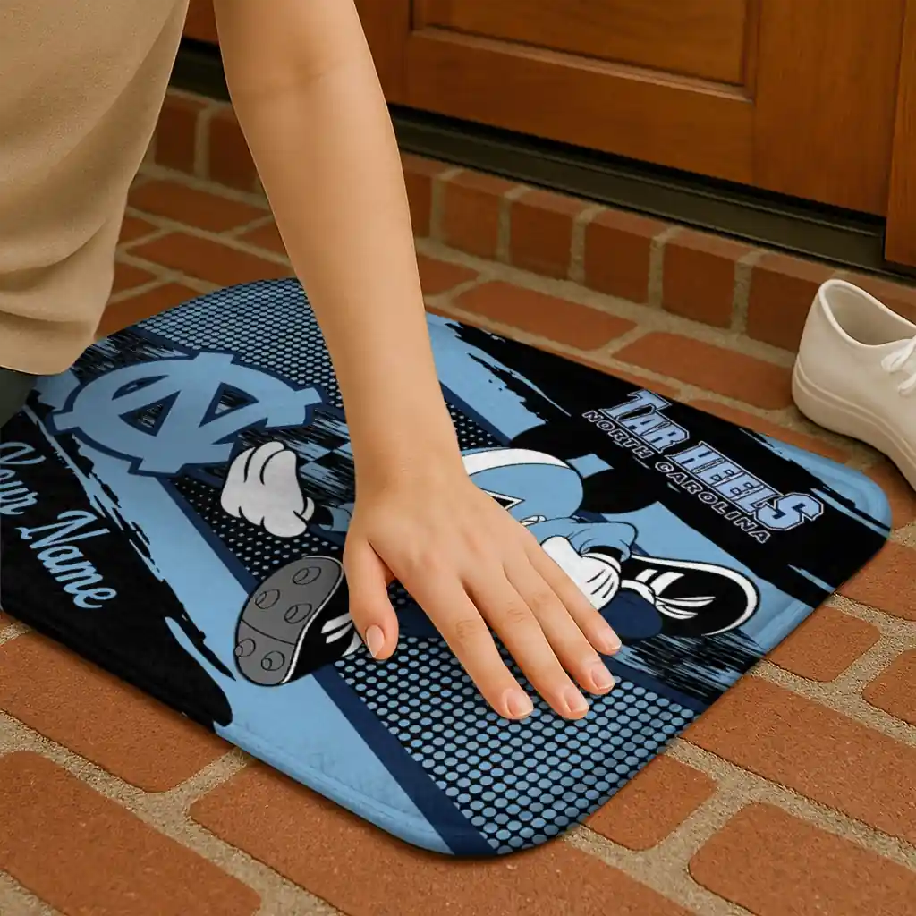custom-north-carolina-tar-heels-mickey-quarterback-light-blue-black-doormat-premium-grade.webp