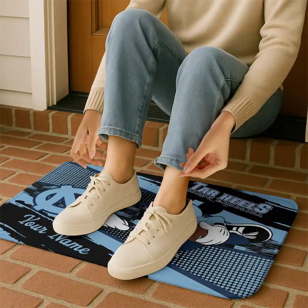 custom-north-carolina-tar-heels-mickey-quarterback-light-blue-black-doormat-top-rated.webp
